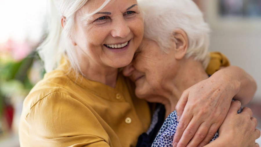 Woman spending time with her elderly mother