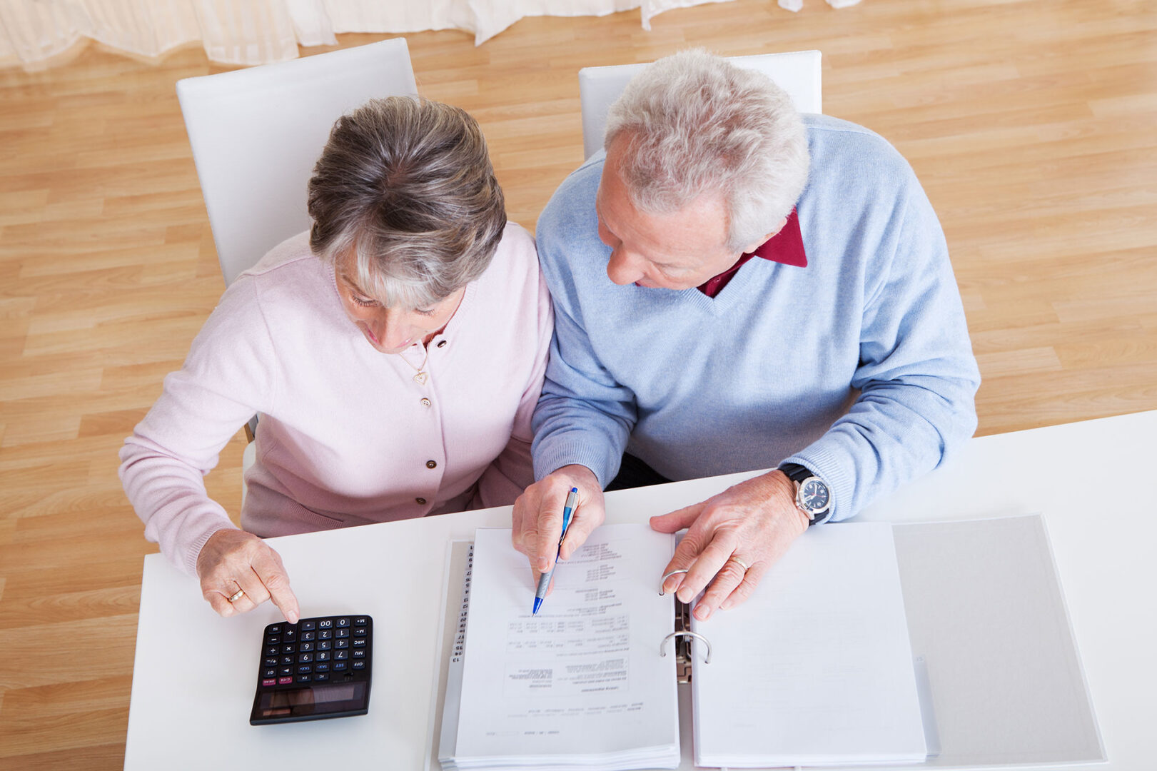 Senior couple looking over their estate plan